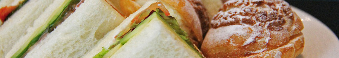 Eating American (New) Sandwich at Urbane Cafe restaurant in Ventura, CA.